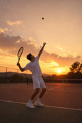 Tennis Serve at Sunset